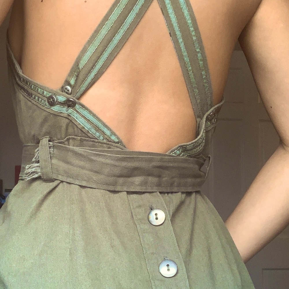 Green open back play dress